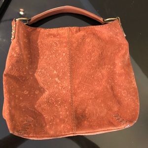 A timeless Lucky Brand  embossed suede hobo purse